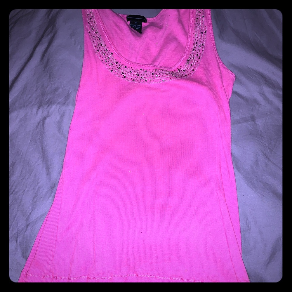 Pink tank top with sequins.
